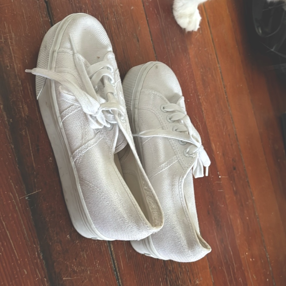 Superga 7.5 women's but fits more like 8.  Worn once.  Platform. White